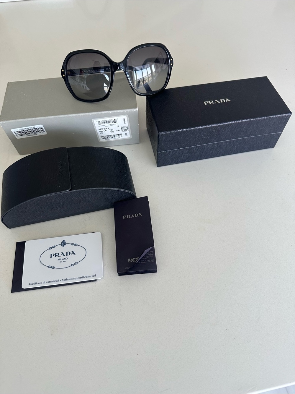 Prada Black Frame Sunglasses with Gray Gradient Lenses